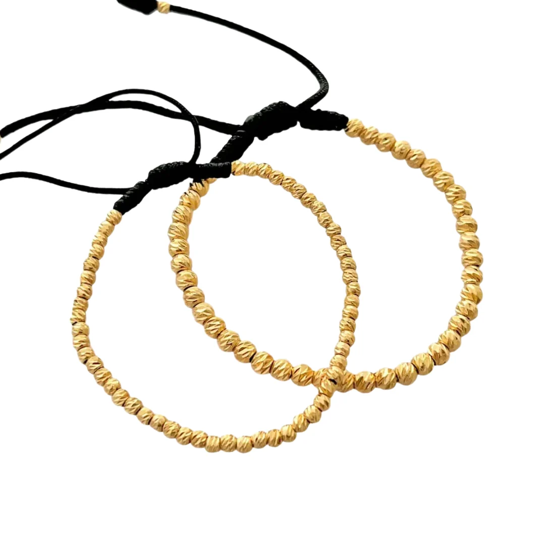 Pulsera Macramé Diamantada - dos pulseras con esferas de corte diamantado en cordón negro
