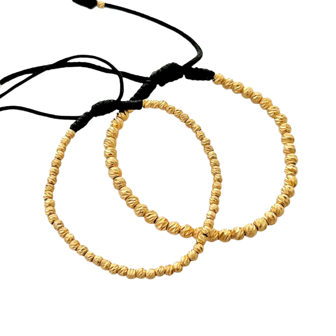 Pulsera Macramé Diamantada - dos pulseras con esferas de corte diamantado en cordón negro
